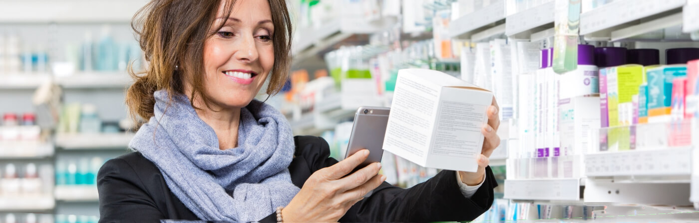 QR Code scanning box in pharmacy with phone